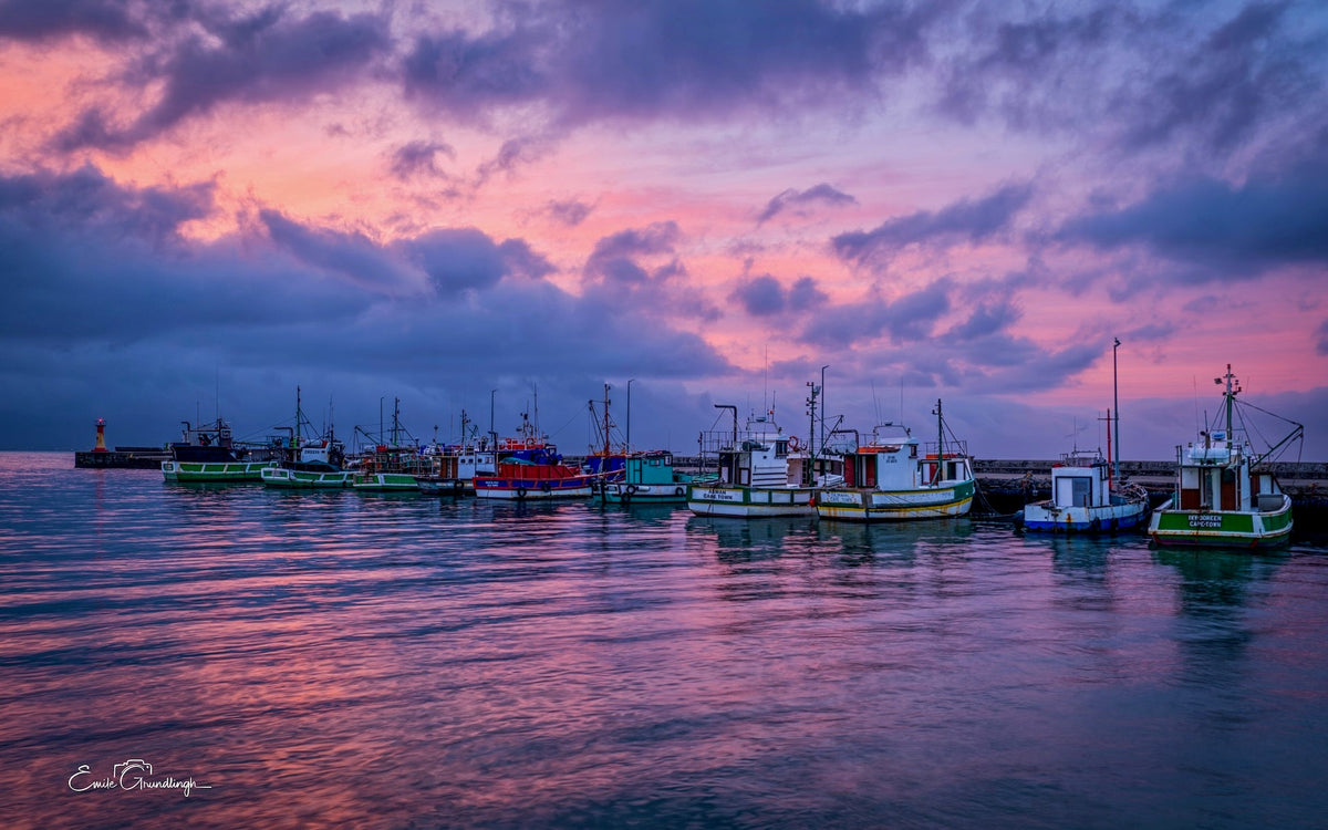 Kalk Bay harbour at sunset by Emile Grundlingh