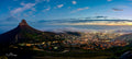 Lion's Head and Cape Town city lights at blue hour with mist rolling in
