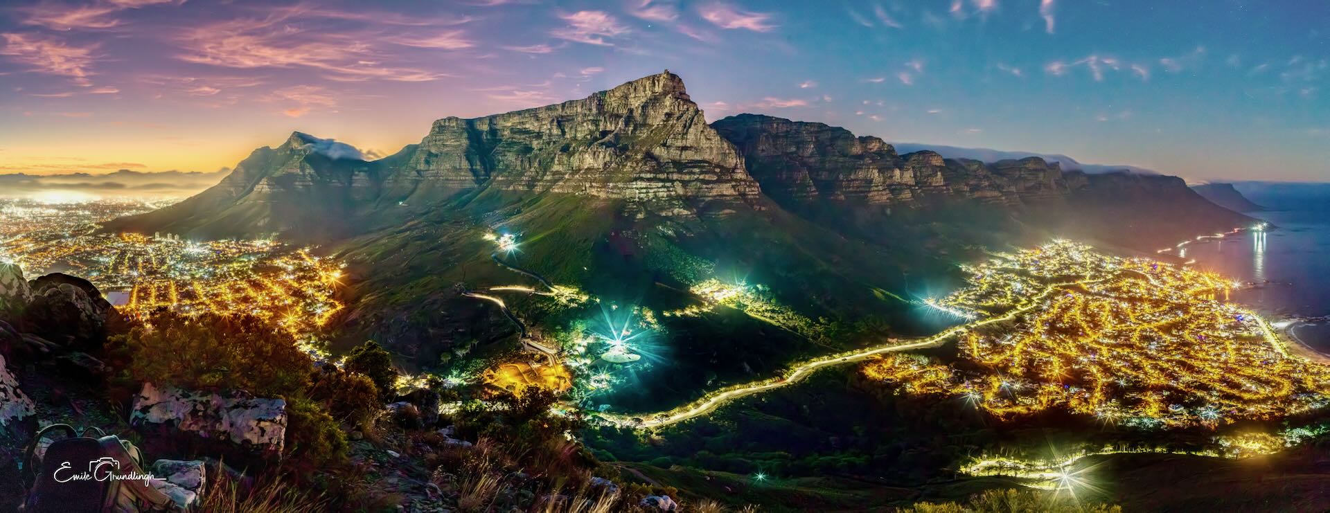 Table Mountain and Twelve Apostles at sunrise panorama from Lion's Head