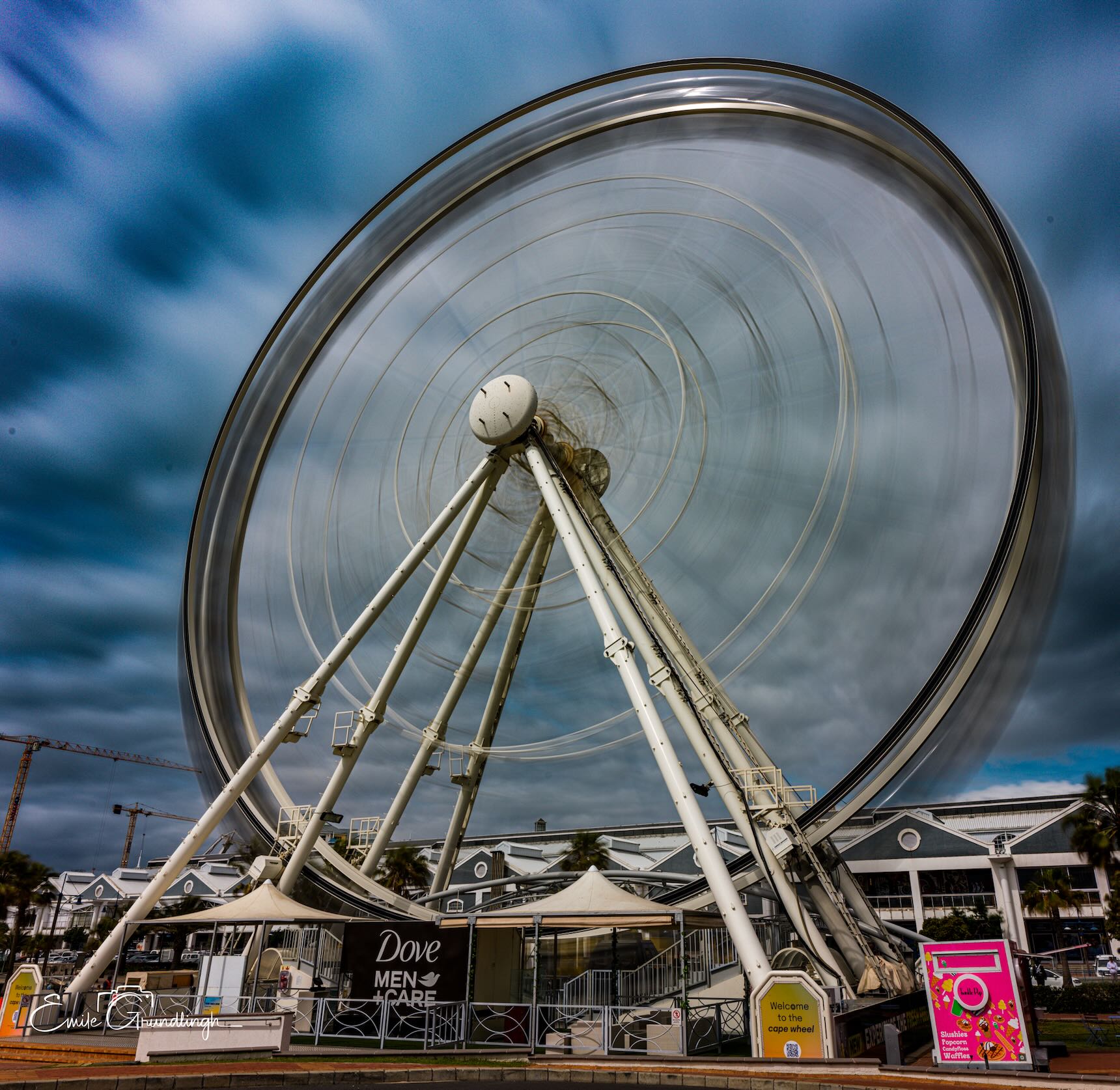 Cape Wheel at V&A Waterfront captured as a blur of spinning motion in a long exposure photograph