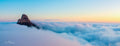 Lion's Head rising above an endless sea of clouds at sunrise aerial panorama