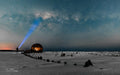 Lone figure with torch beside the Kakapo wreck under the Milky Way on Noordhoek Beach by Emile Grundlingh
