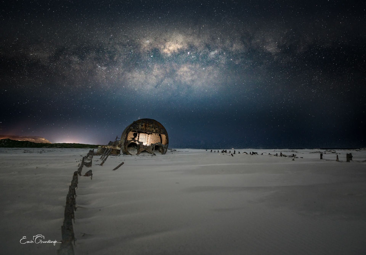 Wide angle view of SS Kakapo shipwreck on Noordhoek Beach under the Milky Way by Emile Grundlingh