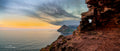 Panoramic view of Chapman's Peak coastline and Hout Bay at sunset from the Sentinel by Emile Grundlingh