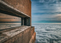 View from Table Mountain cable car station over an endless sea of white clouds with warm sunset light