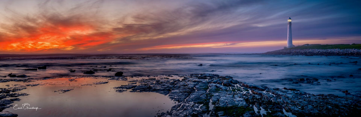 The Last Light of Kommetjie – panoramic sunset over Slangkop Lighthouse with red and violet sky