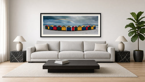 A Rainbow For Muizenberg framed in a modern neutral living room above a linen sofa