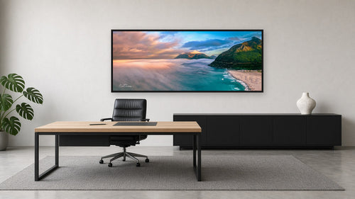 Above the Clouds — Chapman's Peak framed in a modern executive office on a concrete-look wall