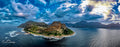 Aerial panorama of the Sentinel rock formation guarding Hout Bay by Emile Grundlingh
