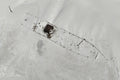 Top-down aerial view of the SS Kakapo shipwreck outline in the sand on Noordhoek Beach by Emile Grundlingh